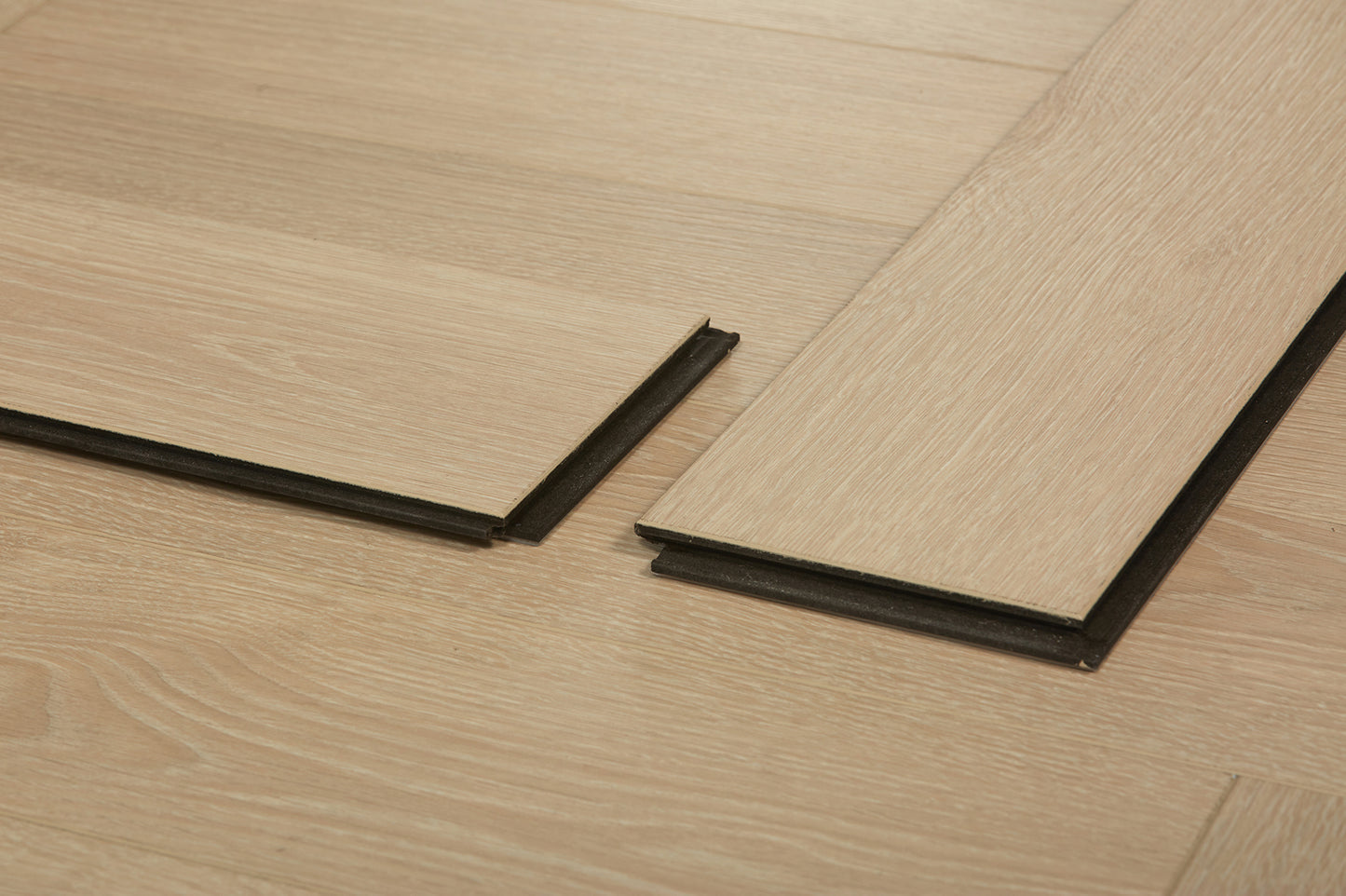 Oakridge Herringbone Lyra Oak EIR 14 mm T x 5" W Uniclic HDF AC5 EIR Waterproof Laminate Wood Flooring (17.38 sq. ft./case)